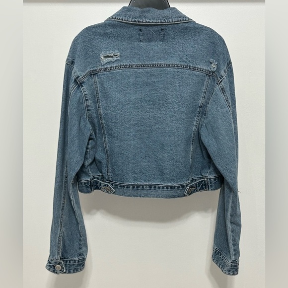 Distressed jean jacket. Cropped length - Picture 2 of 8